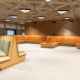 Built-in banquettes and back-to-back benches along wood-panelled walls at UofT Robarts Library